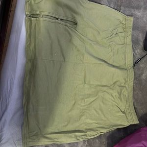 Selling a Sage Khaki Cotton Cut Out Side
Micro Mini Skirt